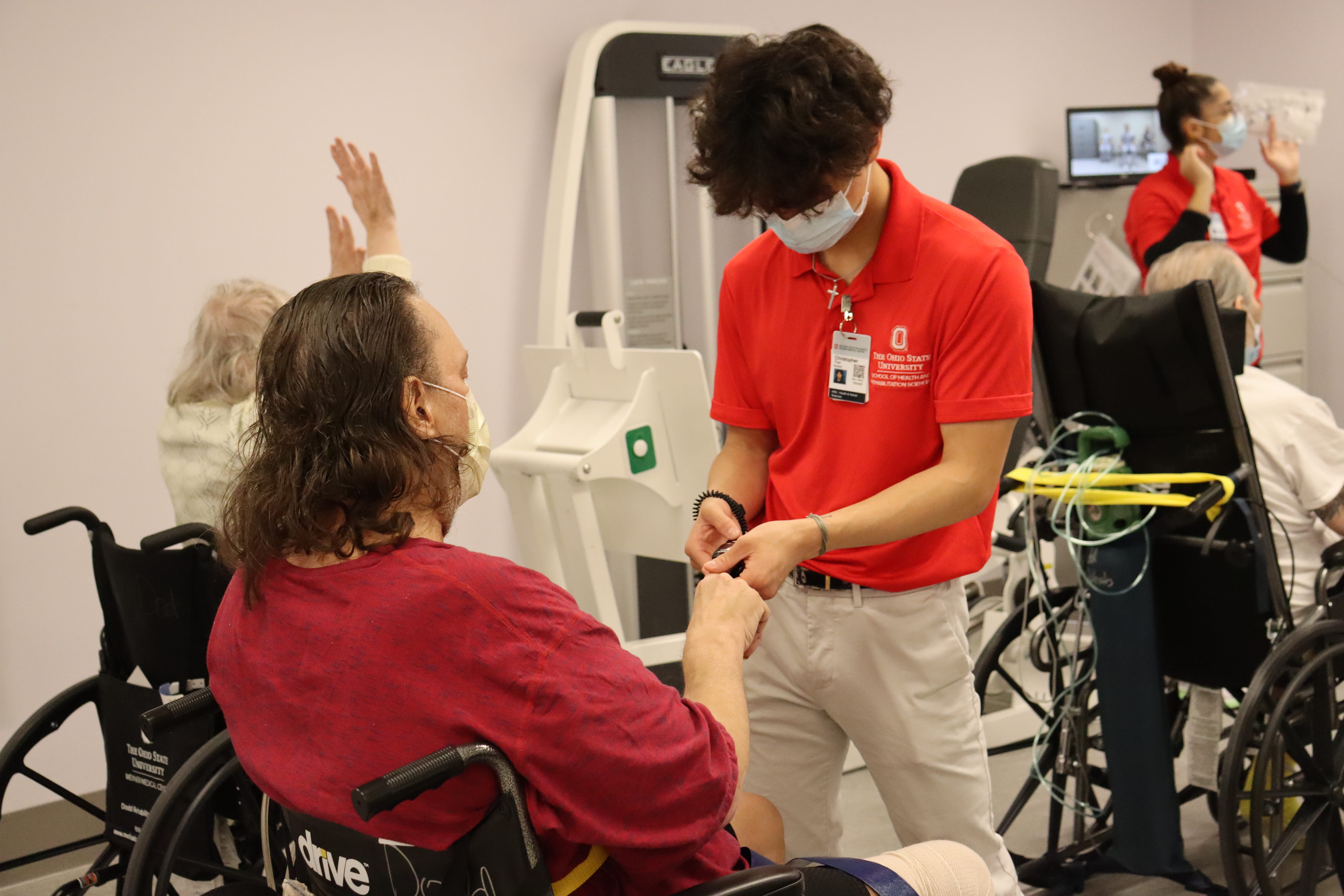 Photo of CARESTREAM student working with a patient at  Dodd Rehab hospital