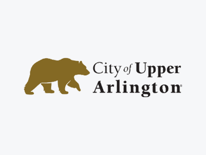 Logo for the city of upper arlington with golden bear