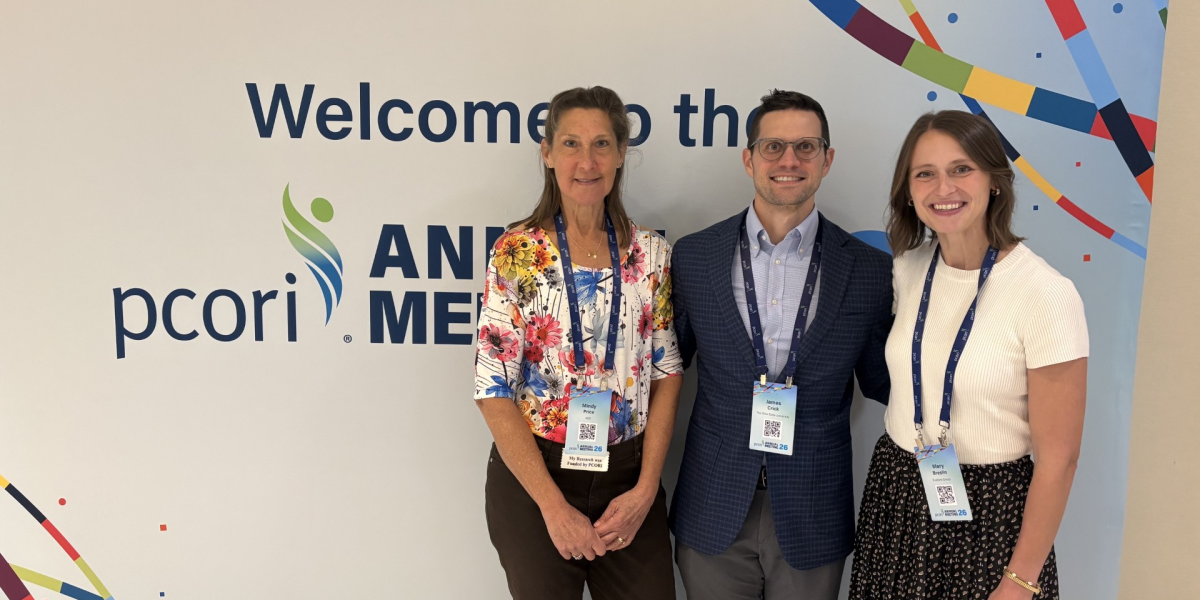 Collaborators of the HEART Trial standing in front of a PCORI-branded back drop. From left to right is Mindy Price, James Crick, and Mary Breslin