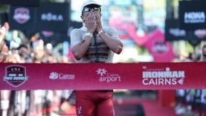 Matthew Marquardt crossing the finish line of the triathlon.